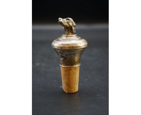 A silver novelty dog's head bottle stopper, by A J Poole, Birmingham 1997, 82mm. 