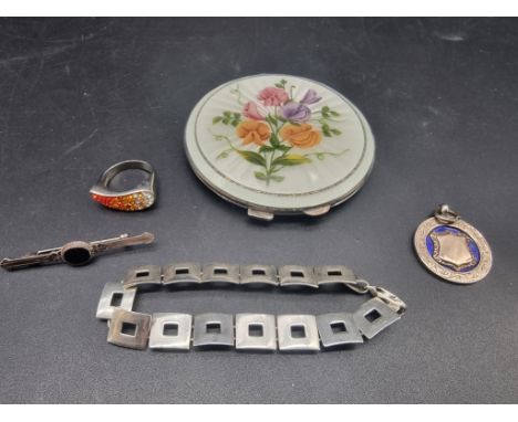 An engine turned silver and guilloche enamel compact, by Turner &amp; Simpson, Birmingham 1958, 7.5cm diameter; together with