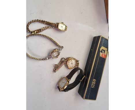 A vintage Bulova gold plated manual wind ladies wristwatch, set four small diamonds, on later expanding bracelet; together wi