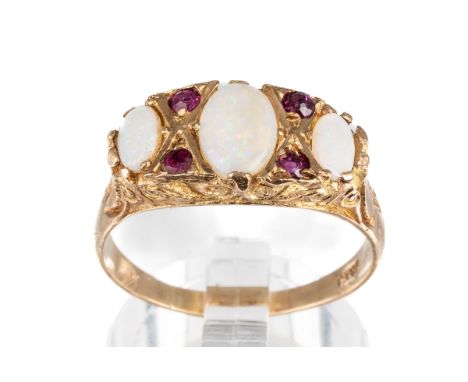 A 9ct yellow gold opal and ruby ring, the three graduated oval cabochon opals with ruby highlights, ring size Q1/2, total gro