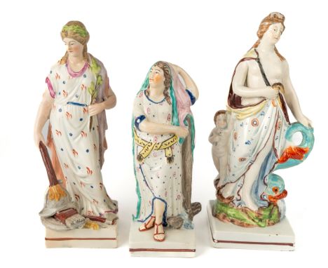 A Staffordshire pearlware figure of Venus, standing beside Cupid and a dolphin, circa 1820, approx 21.5cm high, with a figure
