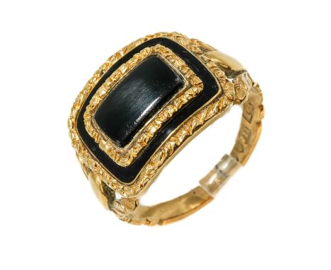 A George III 18ct yellow gold and black enamel mourning ring, with black enamel with chased gold borders, foliate carved shou