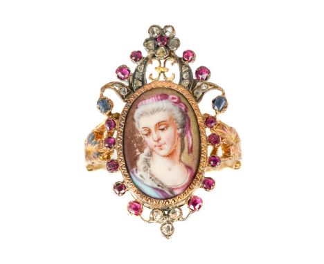 An early 19th century yellow gold gem-set portrait ring, set with an oval portrait of a lady painted on porcelain, the foliat