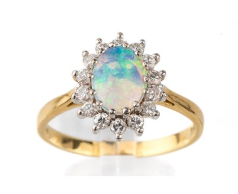 An 18ct yellow gold opal and diamond oval cluster ring, size Q1/2, total gross weight approx 3.8g Good condition, wear commen