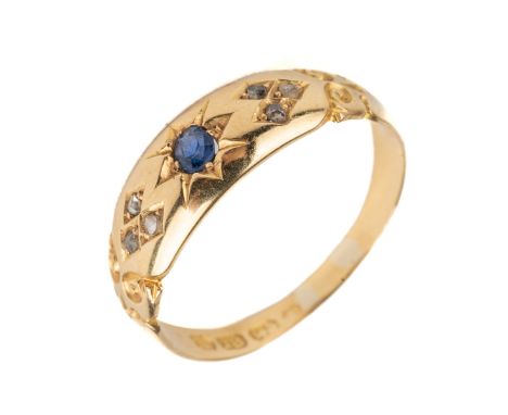An 18ct yellow gold sapphire and diamond chip ring, size P, total gross weight approx 3.1g Generally good condition, stones i