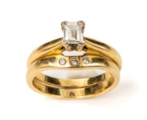 An 18ct yellow gold and diamond solitaire ring, set with a millennium-cut diamond, ring size O, gross weight approx 3.4g; tog