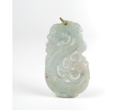 A Chinese carved jade pendant, measures 55mm x 32mm In good condition