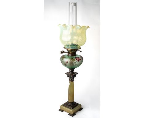 An Antique oil lamp with green alabaster column and etched cameo glass front, with Vaseline glass shade, duplex burner, appro