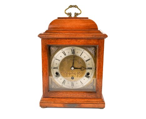 An Elliott eight-day Westminster chime bracket clock, in walnut case, having platform escapement 