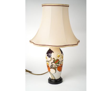 A Moorcroft 'Sandringham Bouquet' pattern lamp, designed by Emma Bossons, on a wooden base, approx 21.5cm high (excluding bas