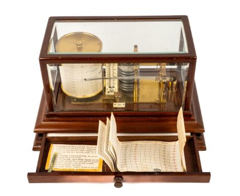 A mahogany cased barograph, with bevelled glass and drawer, complete with charts, premium model with a thermometer Good condi