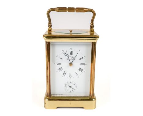 A brass L'Epee repeating carriage clock, with alarm, original key, approx 14cm high without handle In good overall condition.