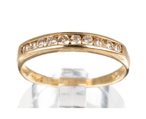 A 9ct yellow gold and diamond ten-stone half eternity ring, channel set round brilliant-cut diamonds total 0.25ct (stamped to