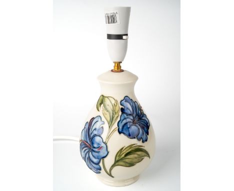 A Moorcroft 'Hibiscus' blue on white lamp 1st quality, marked to base, designer Walter Moorcroft, approx 30cm high including 