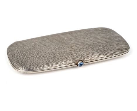 An Art Deco continental silver rounded rectangular cigarette case, the textured case of plain design, with sapphire cabochon 