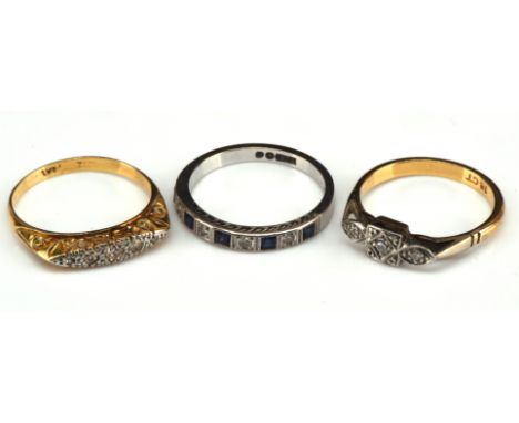 Three gem set rings, including a sapphire and diamond half eternity ring, set with five princess cut sapphires and four round