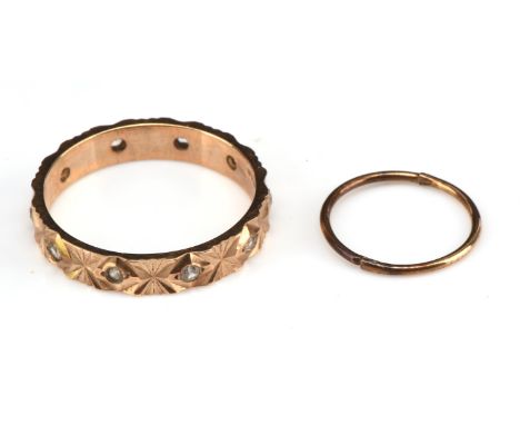 Engraved ring, set with round cut paste stones, hallmarked 9 ct 1981, ring size O 1/2 and one hoop earring, tested as 9 ct Co