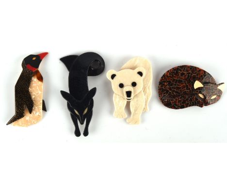 Four Lea stein compressed plastic brooches, including a fox , polar bear, sleeping cat and penguin all signed on V pin clasp.