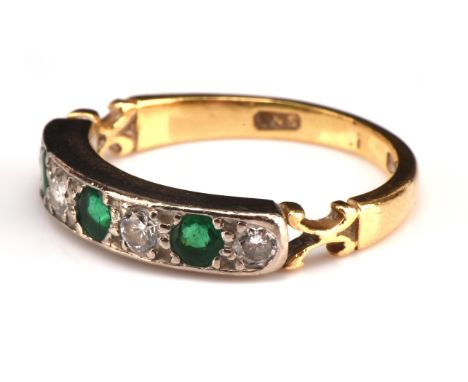 Emerald and diamond half eternity ring, set with round cut emeralds and diamonds, in a milgrain setting with split shoulders,