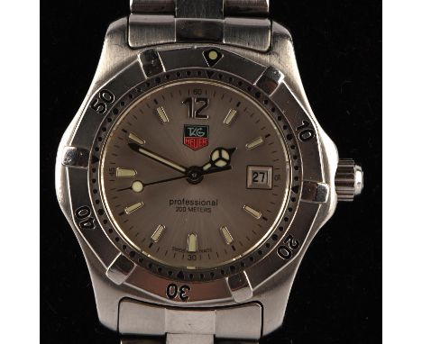 Tag Heuer A Ladies 2000 professional wristwatch in stainless steel case, silver dial with baton hour markers and date at thre