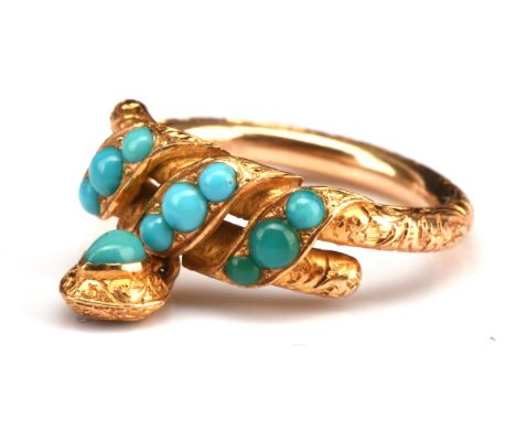 Edwardian turquoise twist ring with heart drop, with entwined scroll motif shoulders, set with graduated turquoise cabochons,