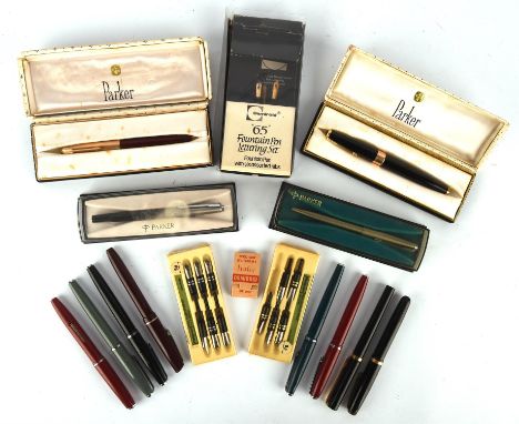 A group of vintage Parker pens  comprising 51 in black lacquer barrel with box,Parker roller ball, Gold capped ballpoint,a st