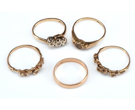 Five gem set rings, including a wedding band, ring size N, with two matching floral design rings, tested as 9 ct, rings size 