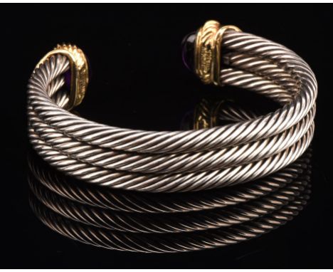 David Yurman three strand cable bangle, set with a square step cut emeralds and amethyst cabochon termination stamped D Yurma