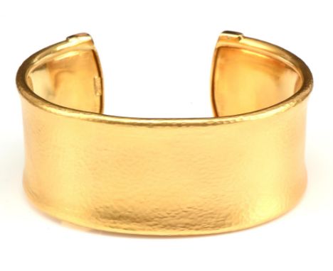 Hammered cuff bangle, with brushed matt finish 27mm thick, measures 67mm in diameter, tested as 14 ct or higherCondition Repo