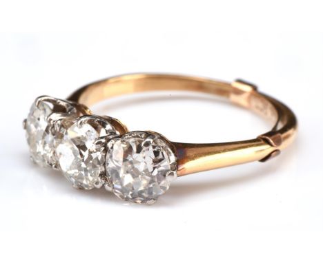 Old cut diamond three stone ring, estimated total diamond weight 1.60 carats, mount to be tested as 18 ct, size K with ring c