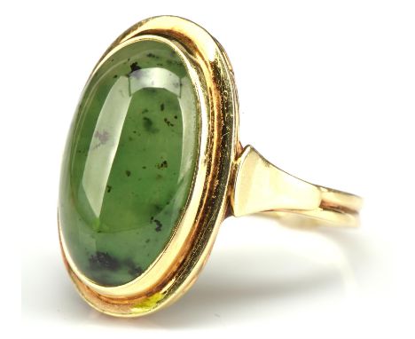 Nephrite jade ring, set with an oval cabochon stone, ring size M, stamped 14 ctCondition Report:  gross weight 6.5 grams