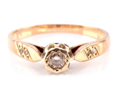 Single stone diamond ring, round brilliant cut diamond weighing an estimated 0.15 carat, with two small single cut diamonds t
