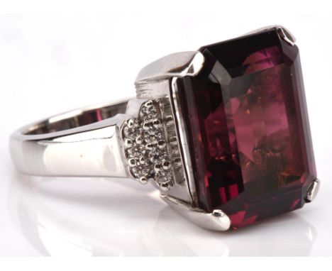 Rubellite and diamond cocktail ring, set with rectangular step cut Rubellite, estimated weight 17.78 carats, with diamond set