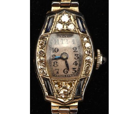 1920's Ladies cocktail watch set with diamonds the unsigned dial with Roman numeral hour markers within a railway minute trac