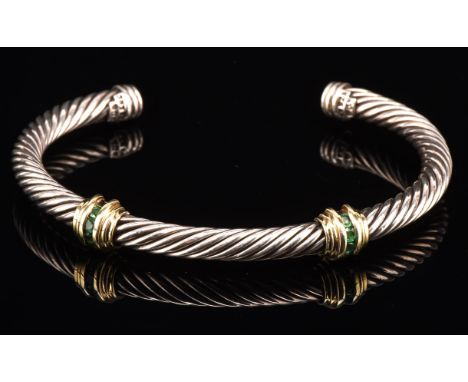 David Yurman cable bangle, set with round cut emeralds with 14 ct mounts, bangle is silver stamped 585 925 D.Y measures 7cm i