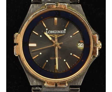 Longines A mid size bi metal wristwatch, the signed  black dial with baton hour markers and date at three, fitted with a quar