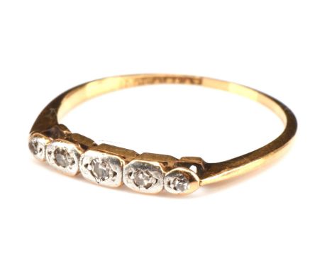 Edwardian ring, set with five old cut diamonds in a a rub over setting, stamped Platinum and 18 ct yellow gold, ring size N, 