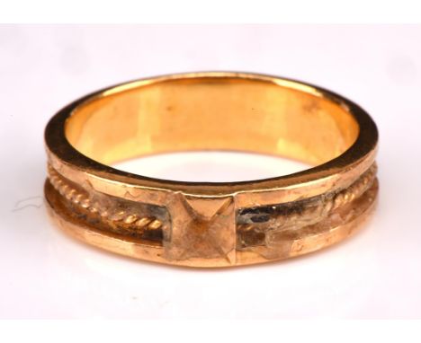 Gold ring with cross and central rope work design, testing as 18 ct, ring size Q Condition Report:  gross weight 5 gramsThe r