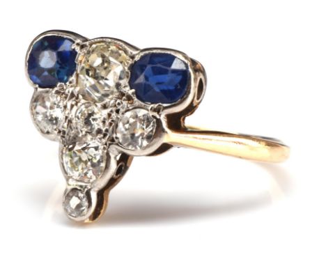 Sapphire and diamond dress ring, set with old cut diamonds, estimated total weigh 0.76 carats and two oval cut sapphires, mou