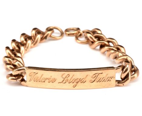 ID bracelet, with a rectangular engraved curved plaque, and curb link chain, with a bolt ring clasp, hallmarked 9 ct, length 