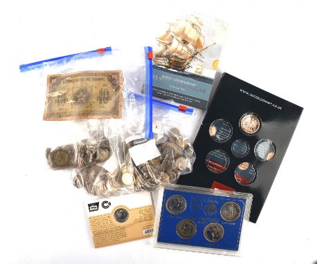 A collection of mostly uncirculated British and world coins, including a complete British 2009 uncirculated annual set, four 