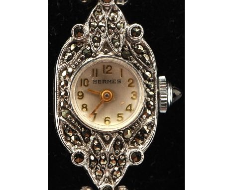 Hermes 1920's cocktail watch, marcasite set bracelet, with oblong case with white dial and Arabic numerals and minute track t