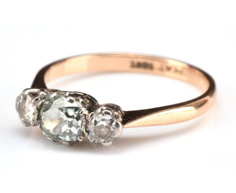 Three stone diamond ring, with a central old cut blue diamond, weighing an estimated 0.60 carat, with an old cut white diamon