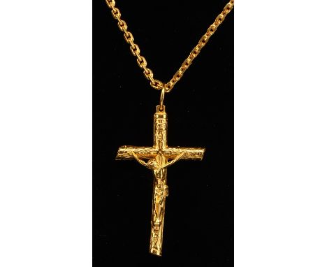 Large engraved Crucifix pendant, measuring 60x34mm, on a fancy link necklace 60cm, with S clasp, both tested as 18 ct Conditi