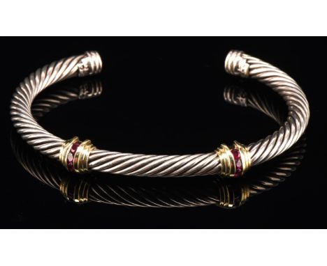 David Yurman cable bangle, set with round cut rubies with 14 ct mounts, bangle is silver stamped 585 925 D.Y measures 7cm in 