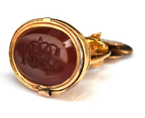 19th C locket topped fob seal, with oval carnelian engraved with initials, with concealed locket behind, with dog, hunting ba