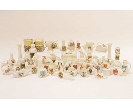 A pair of silver mounted Royal Worcester coffee cans, and a collection of crested china