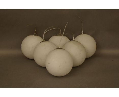 A set of seven contemporary globe lights