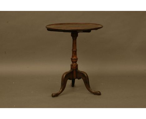 A 19th century mahogany tilt top table, the circular dish top on tripod base, 54.5cm diameter, 67cm high