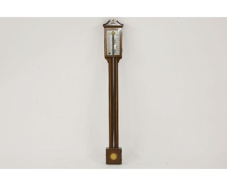 A George III style barometer, with silver dial behind glazed door